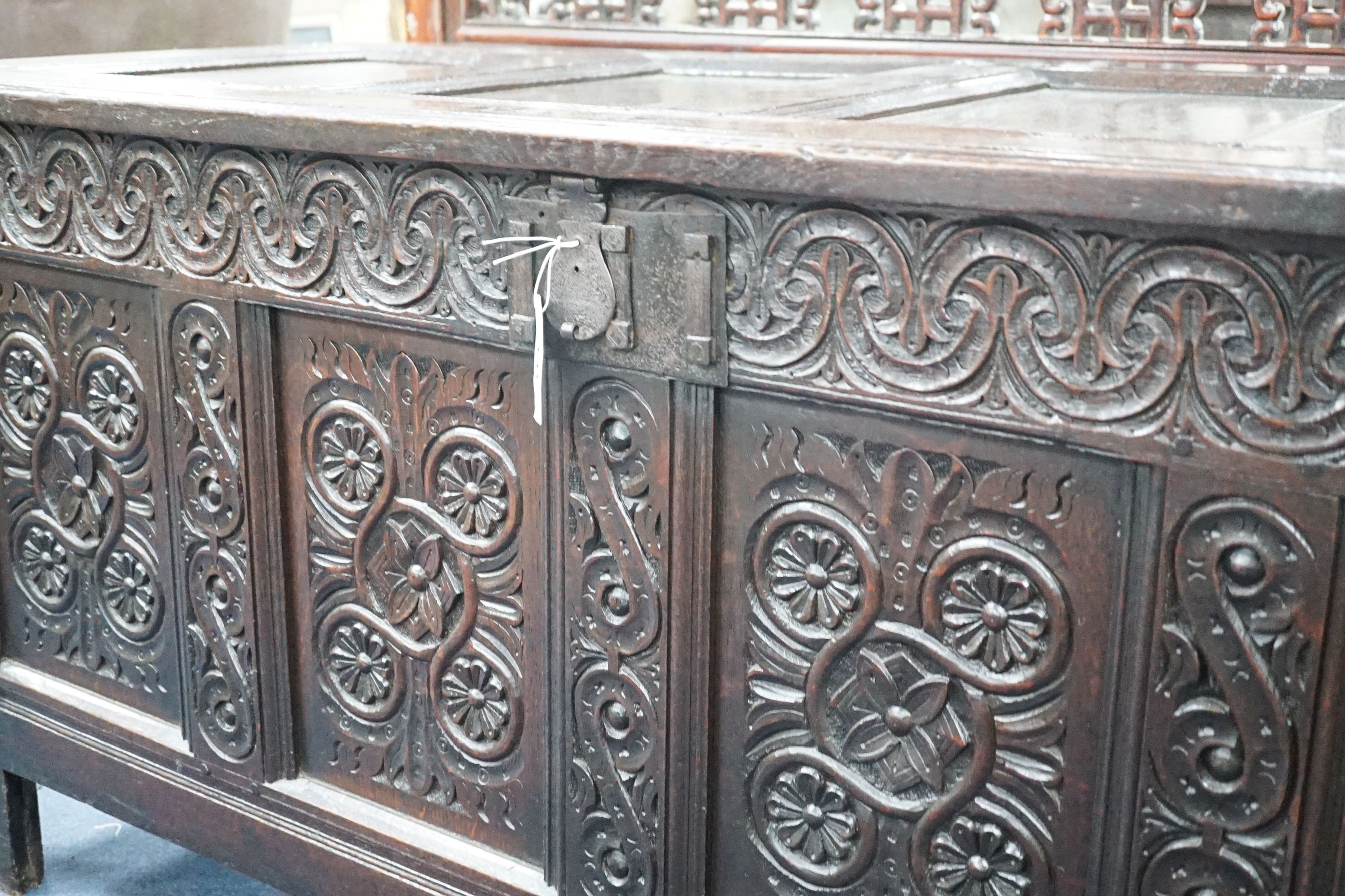 A 17th century Gloucestershire area carved, panelled oak coffer, length 150cm, depth 58cm, height 69cm